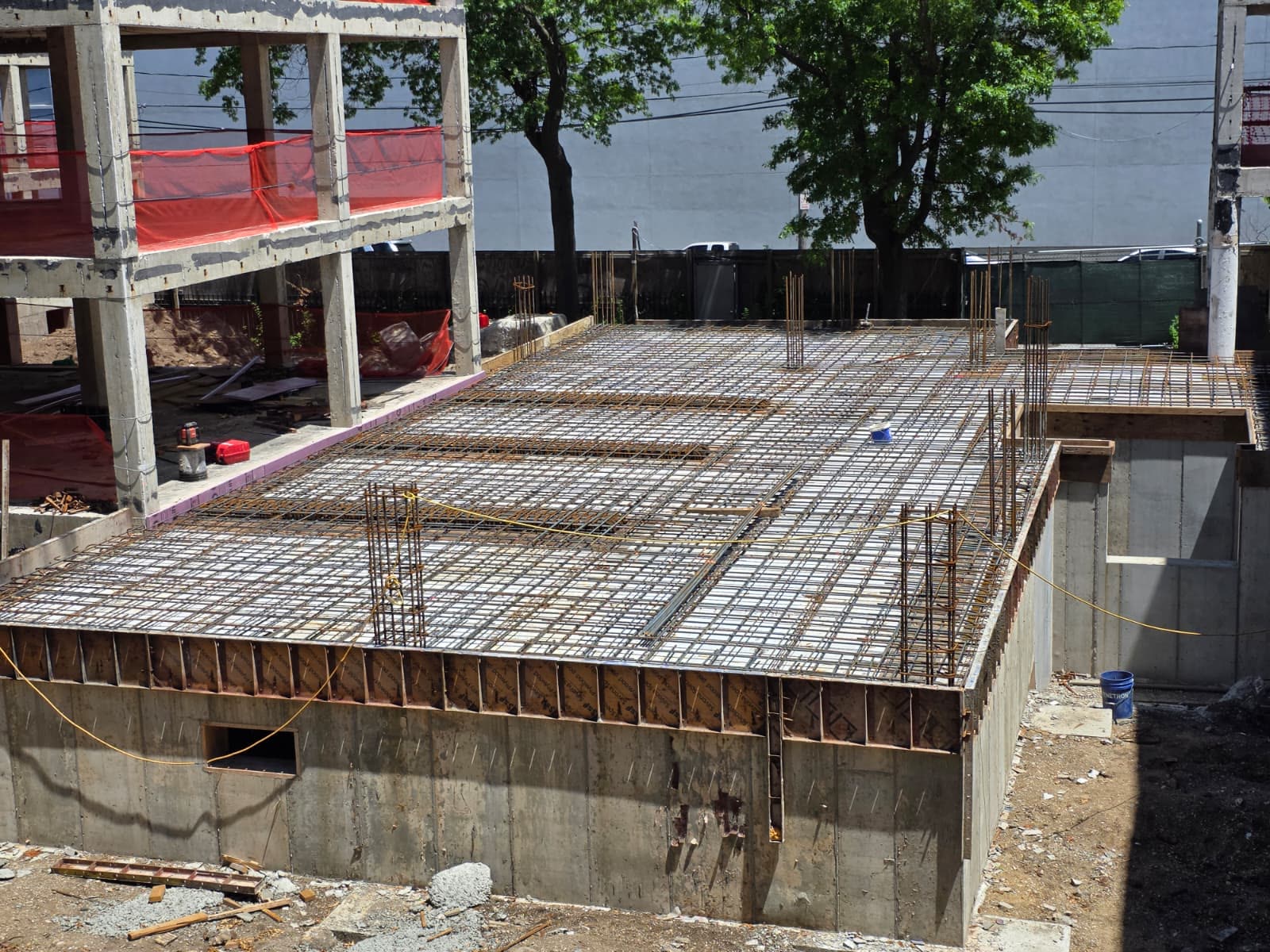 Rebar mat and steel deck